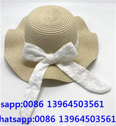 Chapéu de praia de palha com laço