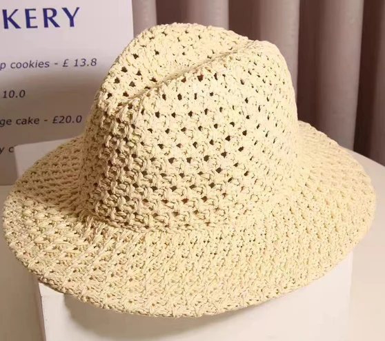 Chapéu de palha feito à mão com flor vazada para mulheres